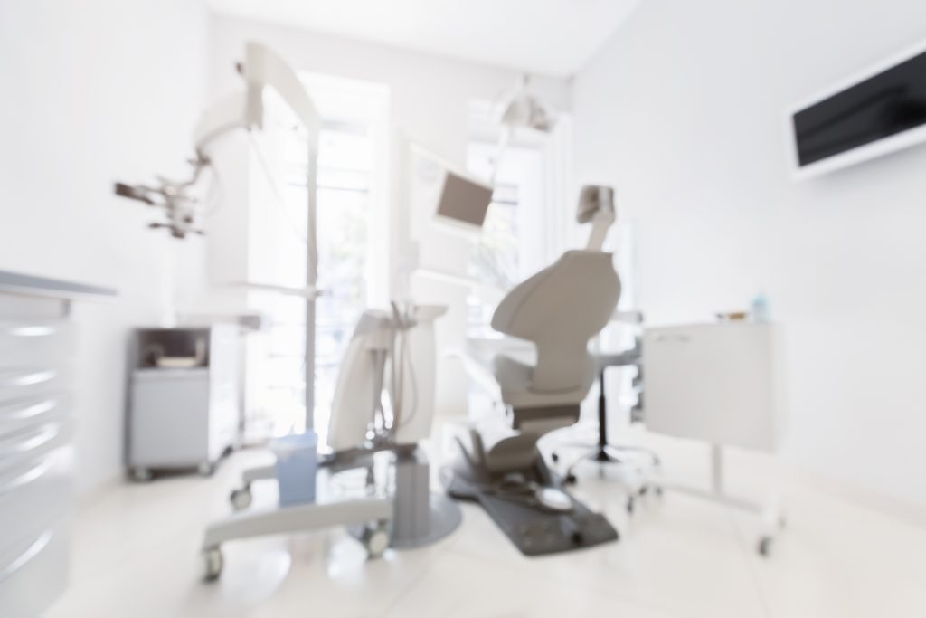 Blurred image of new modern dental clinic office